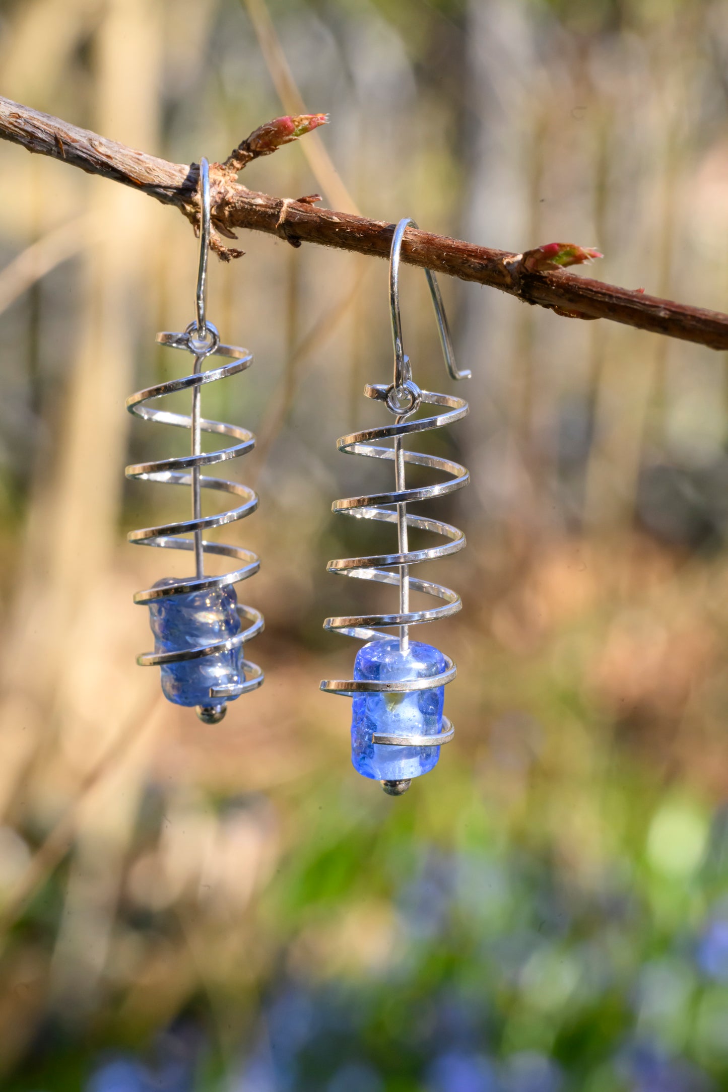Ribbon spiral earrings with tiger's eye
