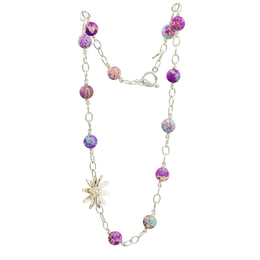 Necklace with aquamarine stone and a silver flower