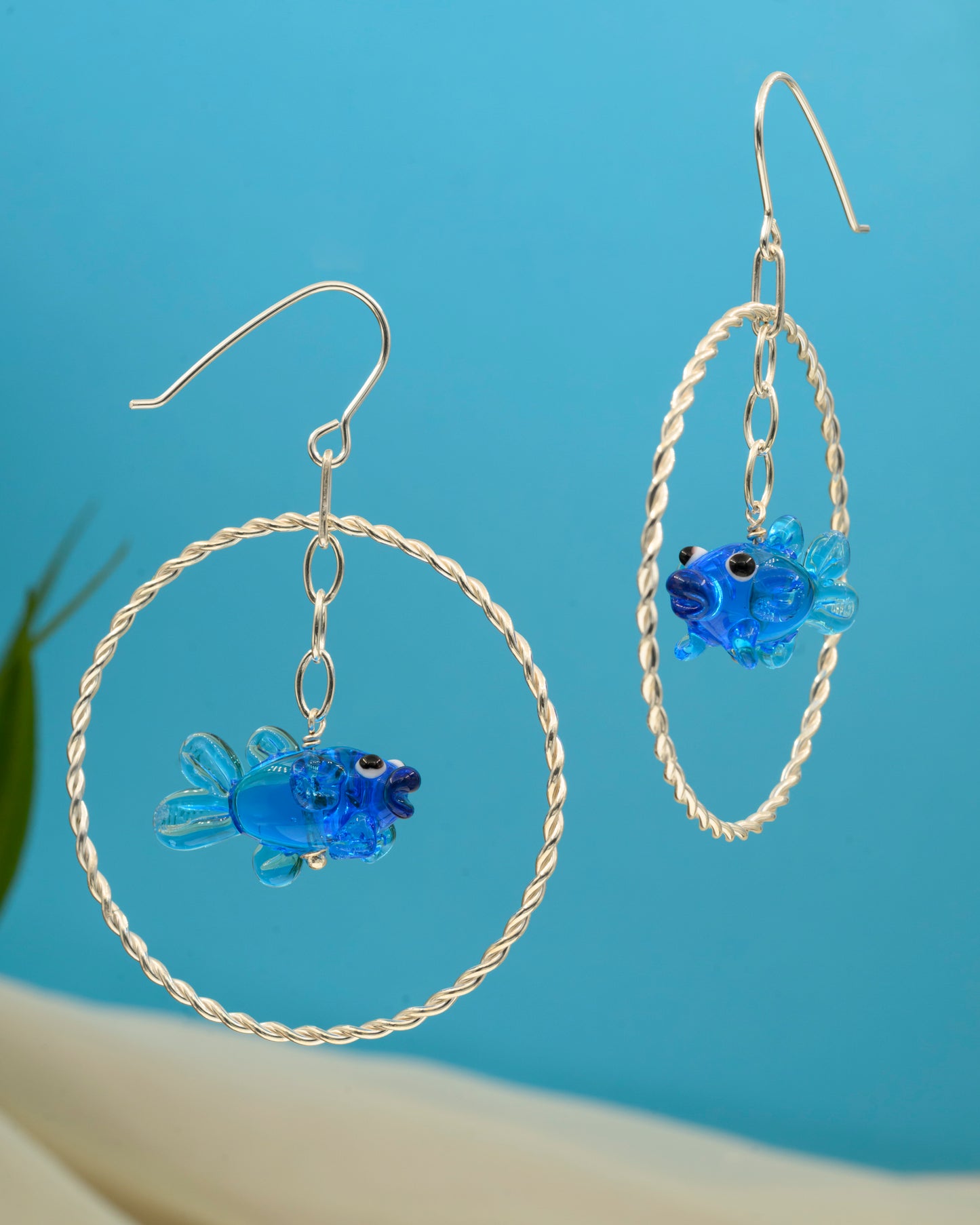 Earrings with blue fish