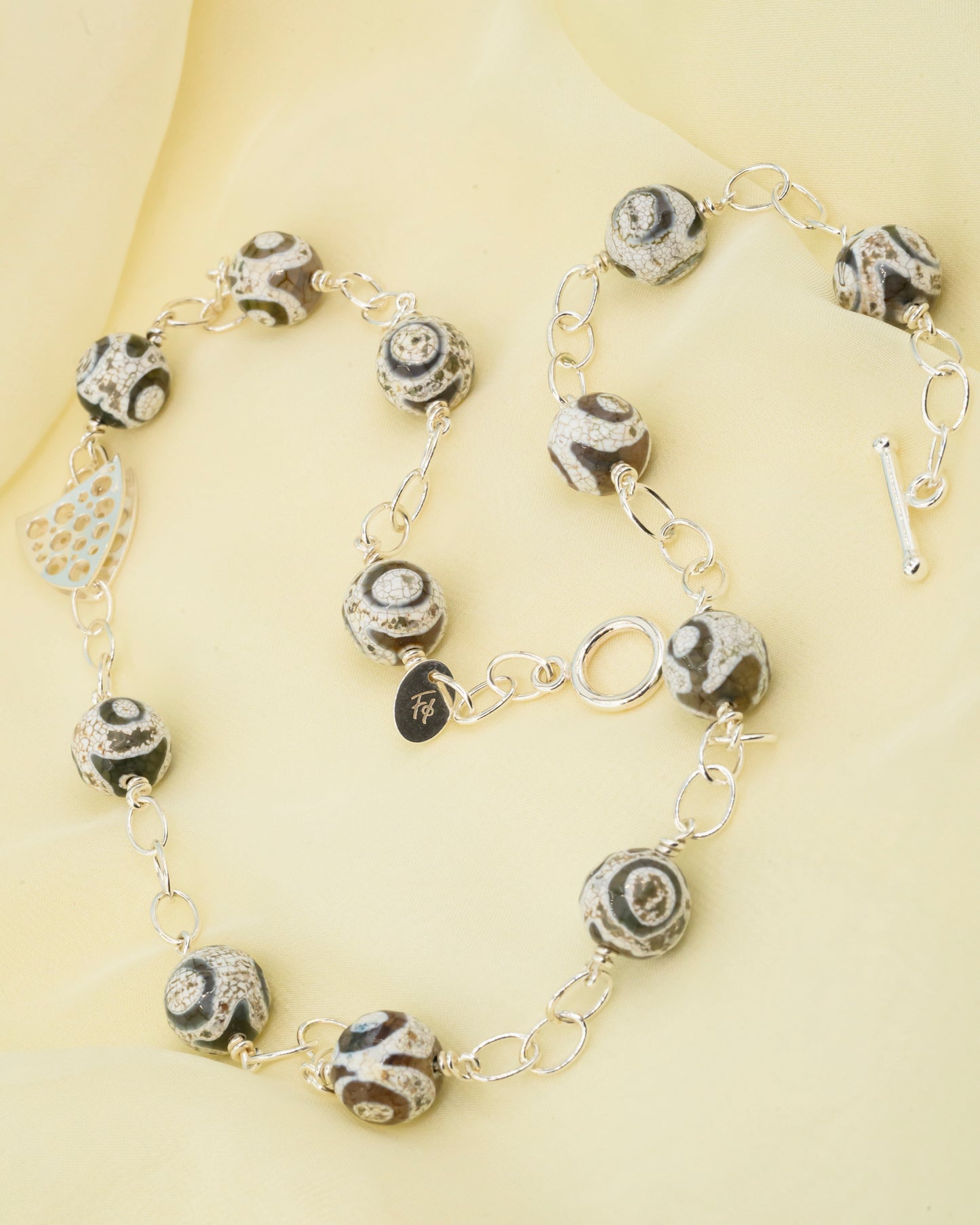 Butterfly necklace with black and white agates