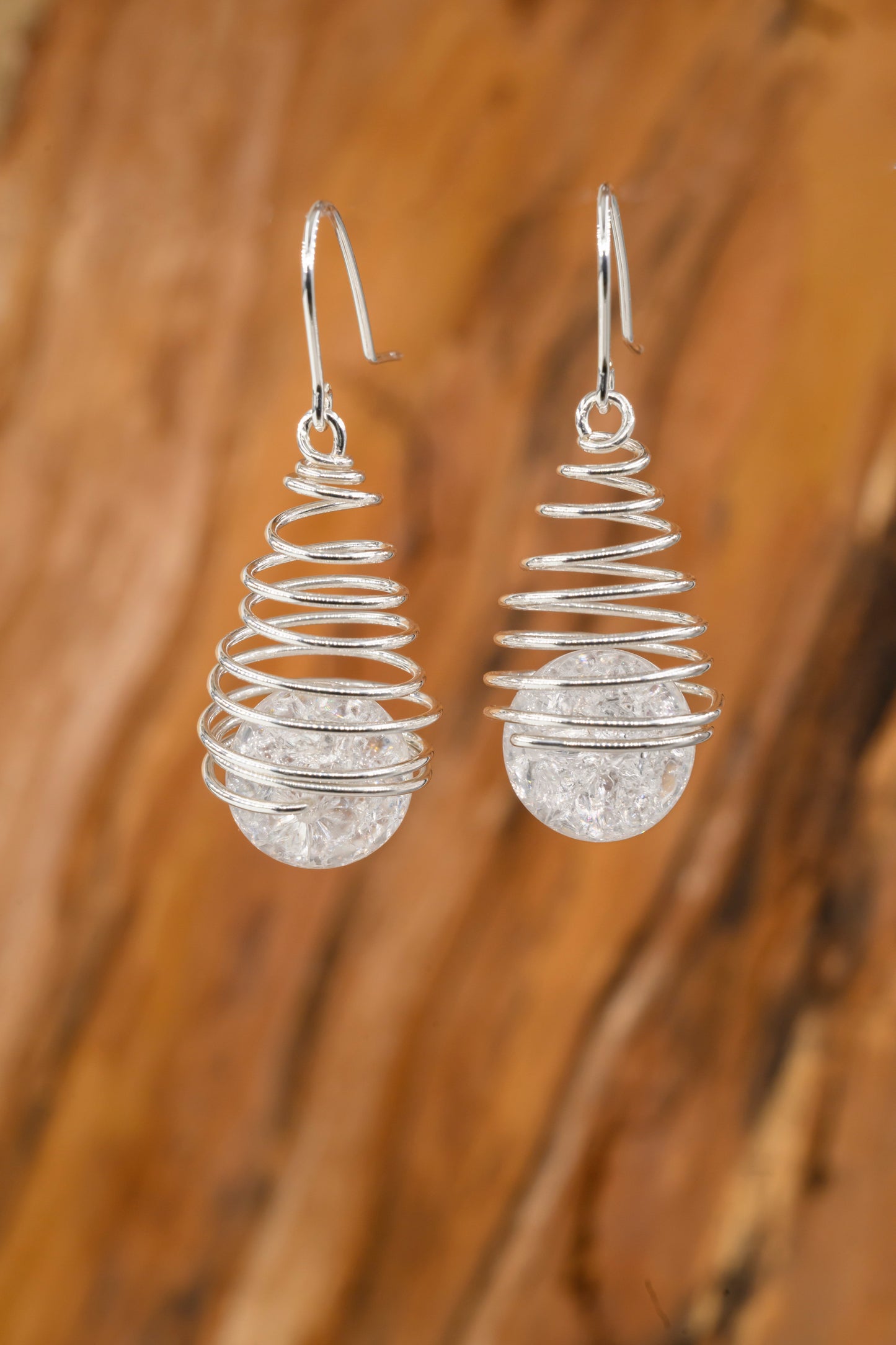 Spiral earrings with rock crystal