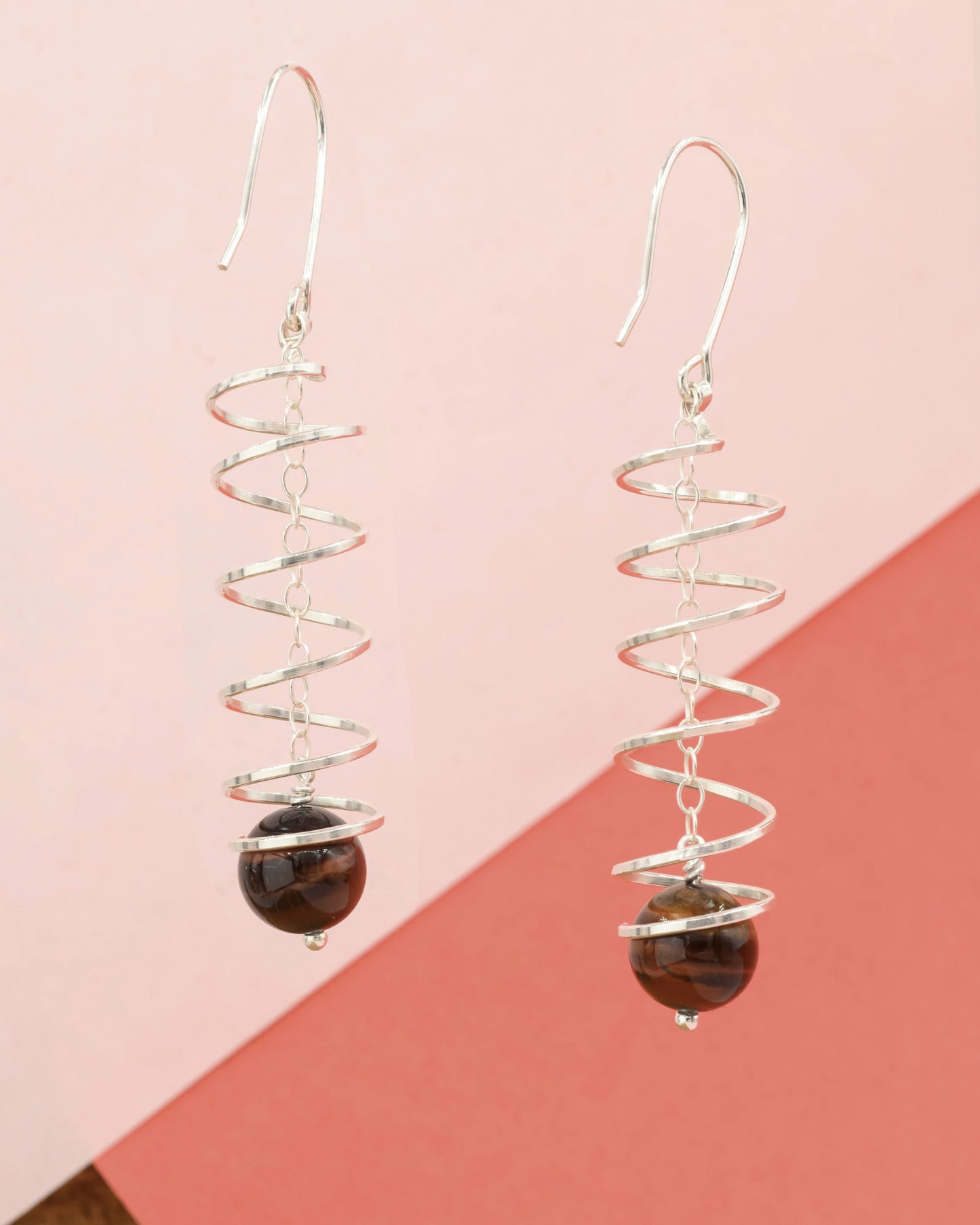 Ribbon spiral earrings with tiger's eye